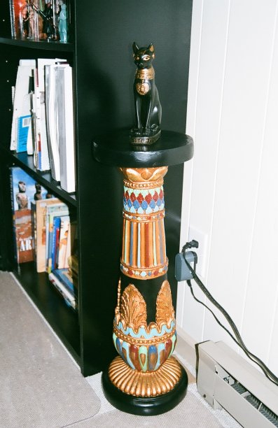 Akasha as Bast Avatar Statue on Egyptian Pedestal